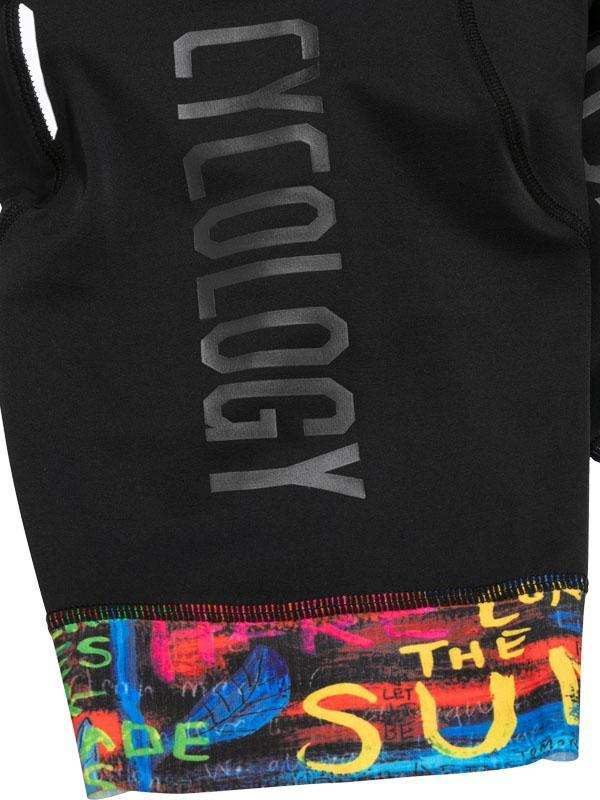 Black cycling jersey with 'CYCOLOGY' text and colorful graphic hem, men's or women's bike wear