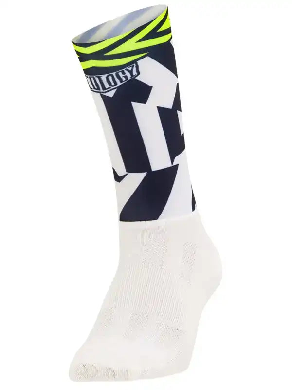 Cycling sock with bold black and white graphic design, neon yellow accents, and breathable mesh fabric.