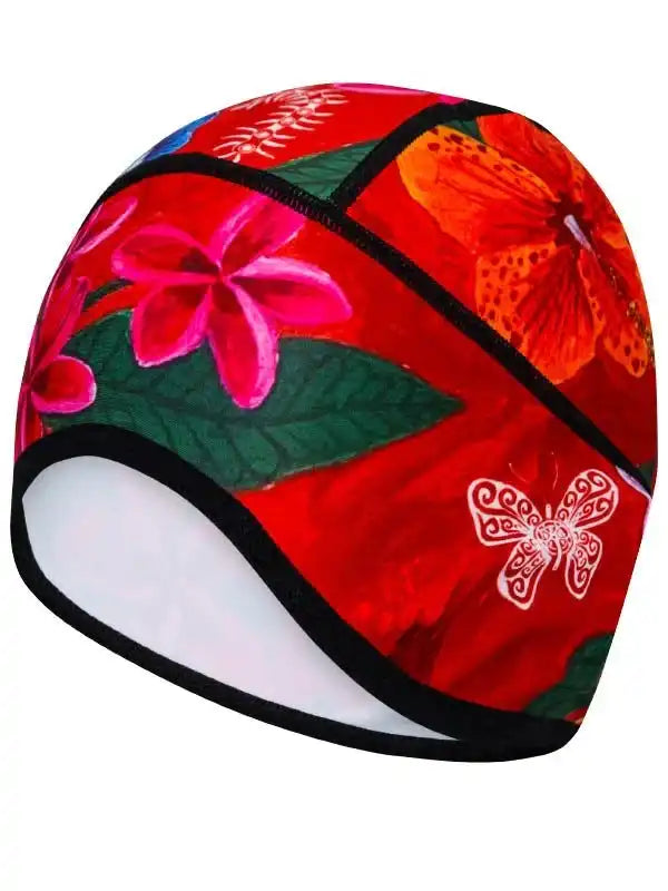 Vibrant floral cycling cap with pink flowers, green leaves, and butterfly design on red background