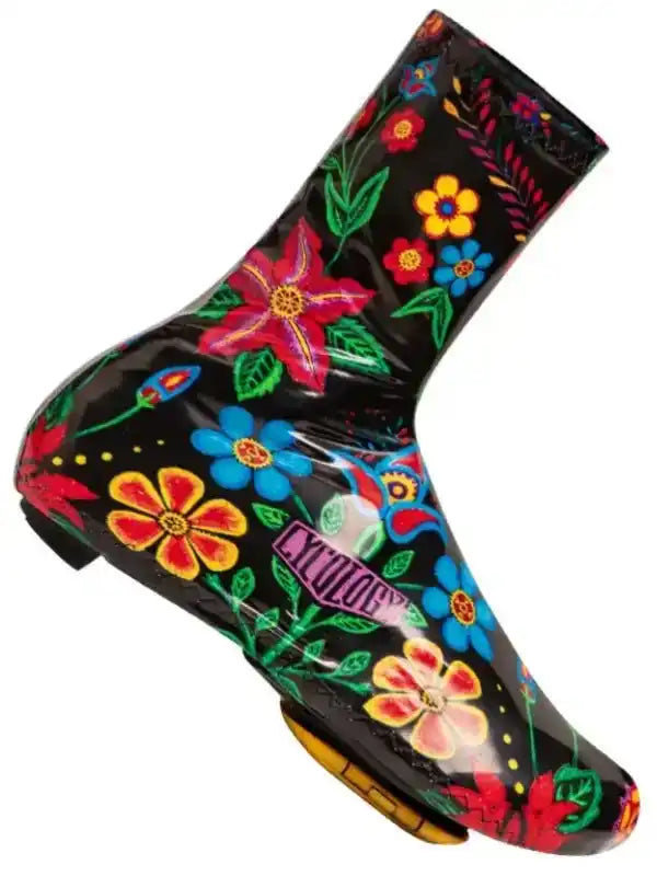 Black cycling shoe cover with vibrant floral print, waterproof design for road bike rides