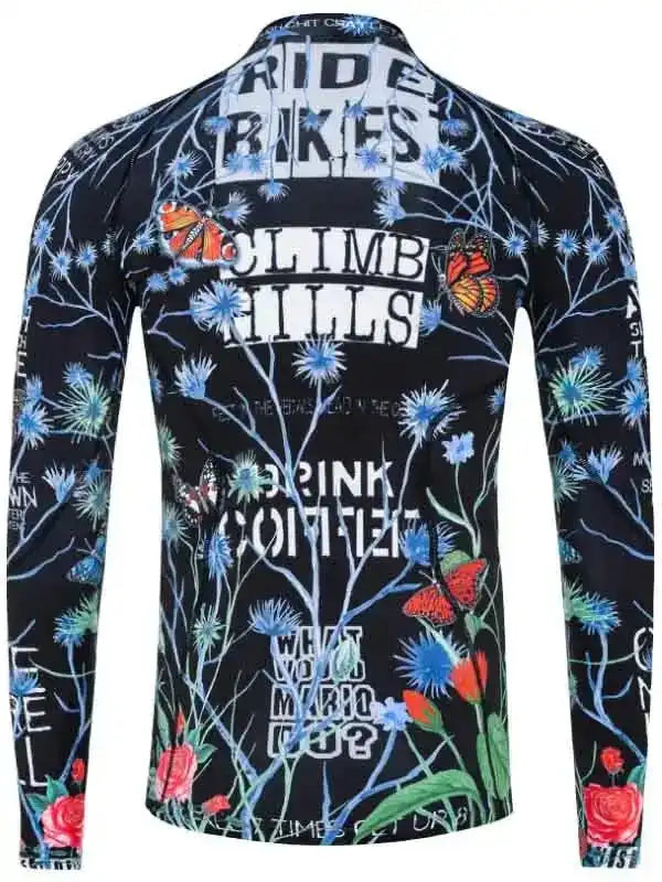 Men's long sleeve cycling jersey with floral print, butterflies, and motivational phrases like 'Ride Bikes' and 'Climb Hills'
