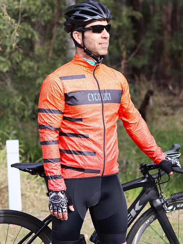cycling gear eur Inspire Orange Mens Lightweight Wind Cycling Jacket | Cycology EU