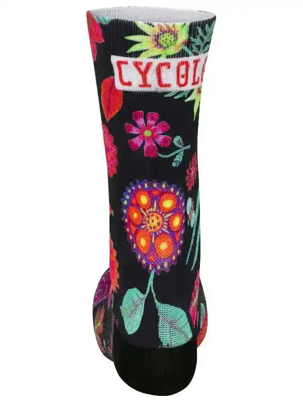 Black cycling sock with vibrant floral pattern and CYCOLO logo, designed for comfort and style.