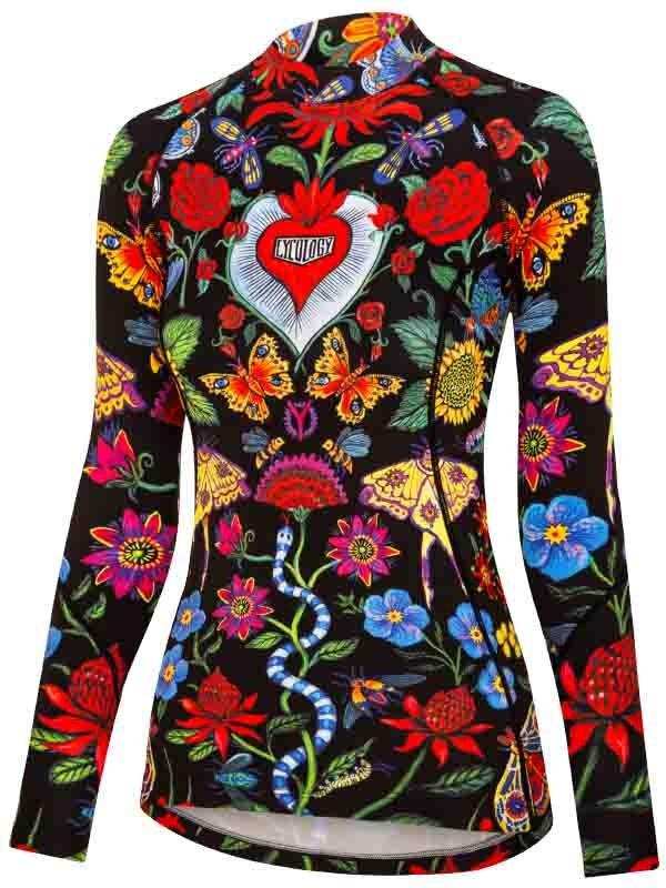 Women's cycling jersey with vibrant floral and butterfly print, featuring heart logo on black background