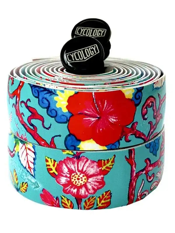Vibrant floral cycling handlebar tape with red hibiscus design, ideal for road bikes and bike accessories.