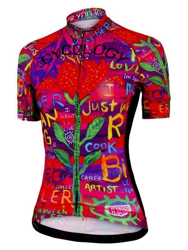 Vibrant women's cycling jersey with colorful graffiti-style art, strawberries, and bold text designs