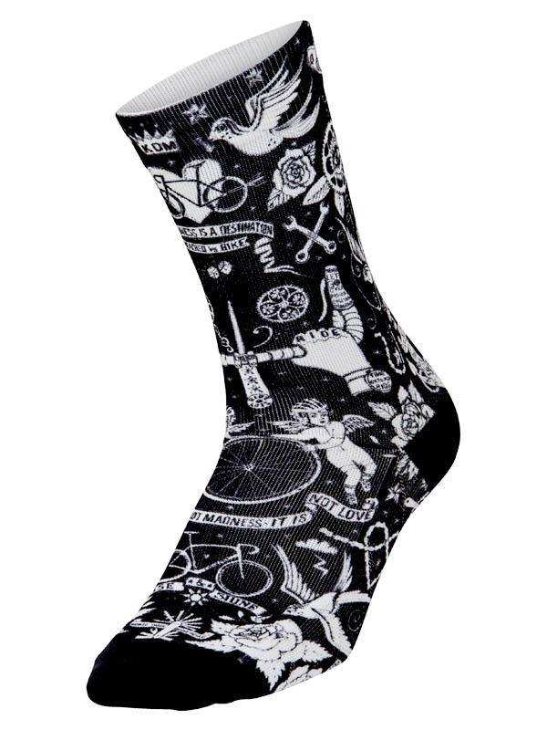 Black and white cycling sock with tattoo-style graphics including bikes, roses, and cherubs for men and women