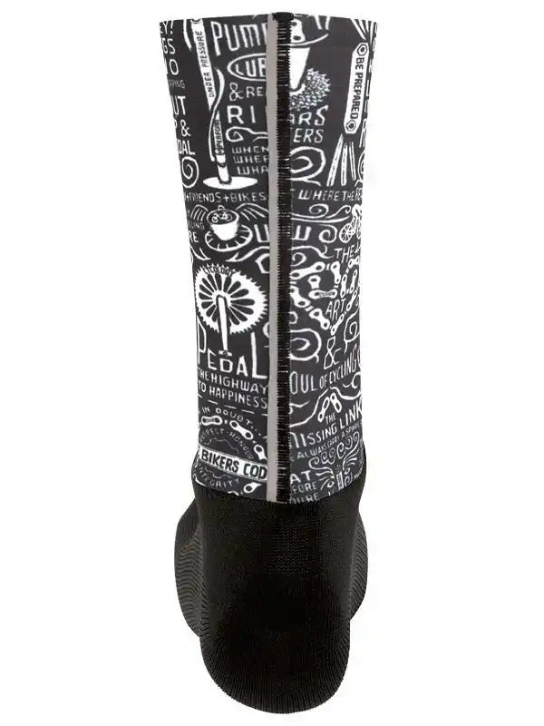 Black cycling shoe cover with white bike-themed graphics and text, designed for men and women riders
